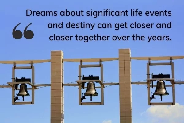 Picture of three bells hanging up in a row against the sky, with text: Dreams about significant life events and destiny can get closer and closer together over the years